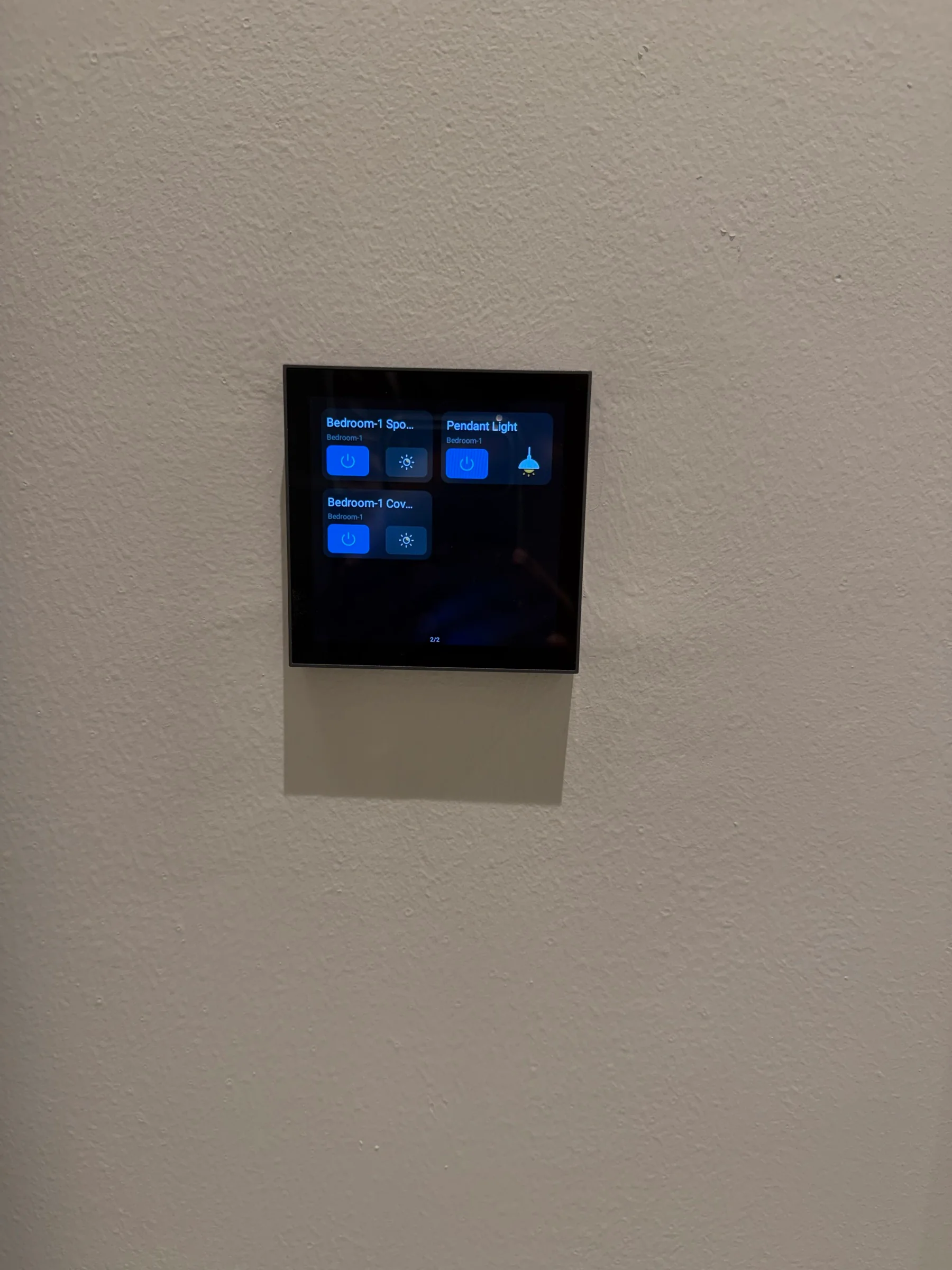 Wall-mounted touch control showing bedroom lighting scenes at the Shoreline residence